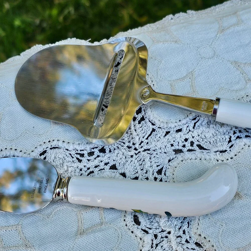 Christmas Sheffield soft cheese spreader and plane stainless w ceramic handles